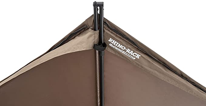 A brown tent close-up with a white background and a 4x4 pullout awning.