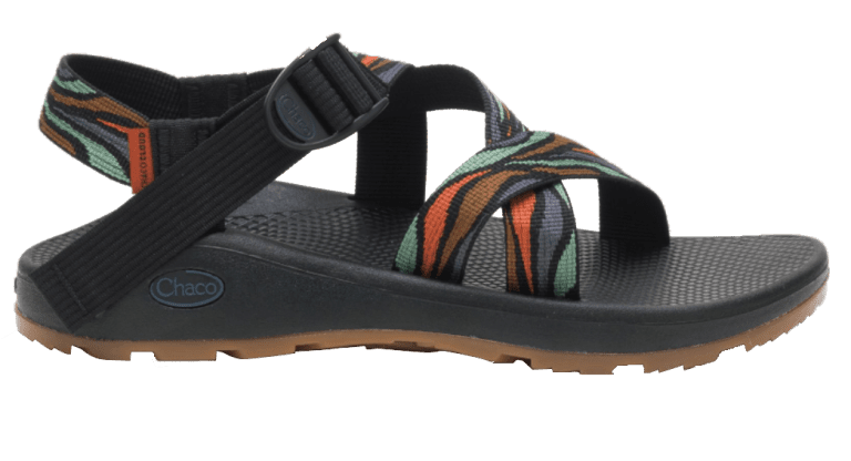 a women's sandal with a multicolored strap.