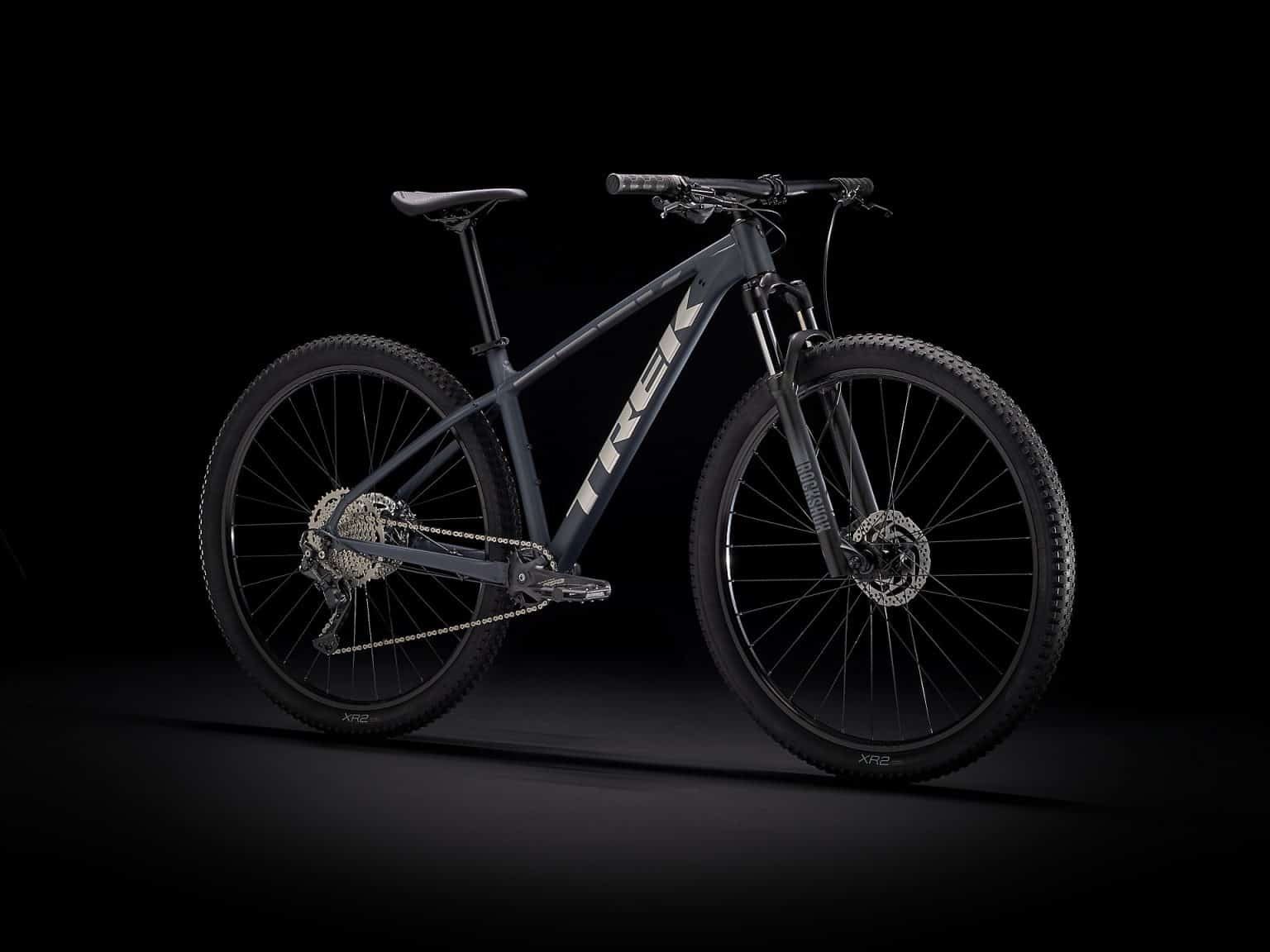 a mountain bike is shown in the dark.