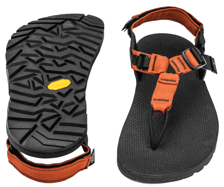 a pair of black and orange sandals.