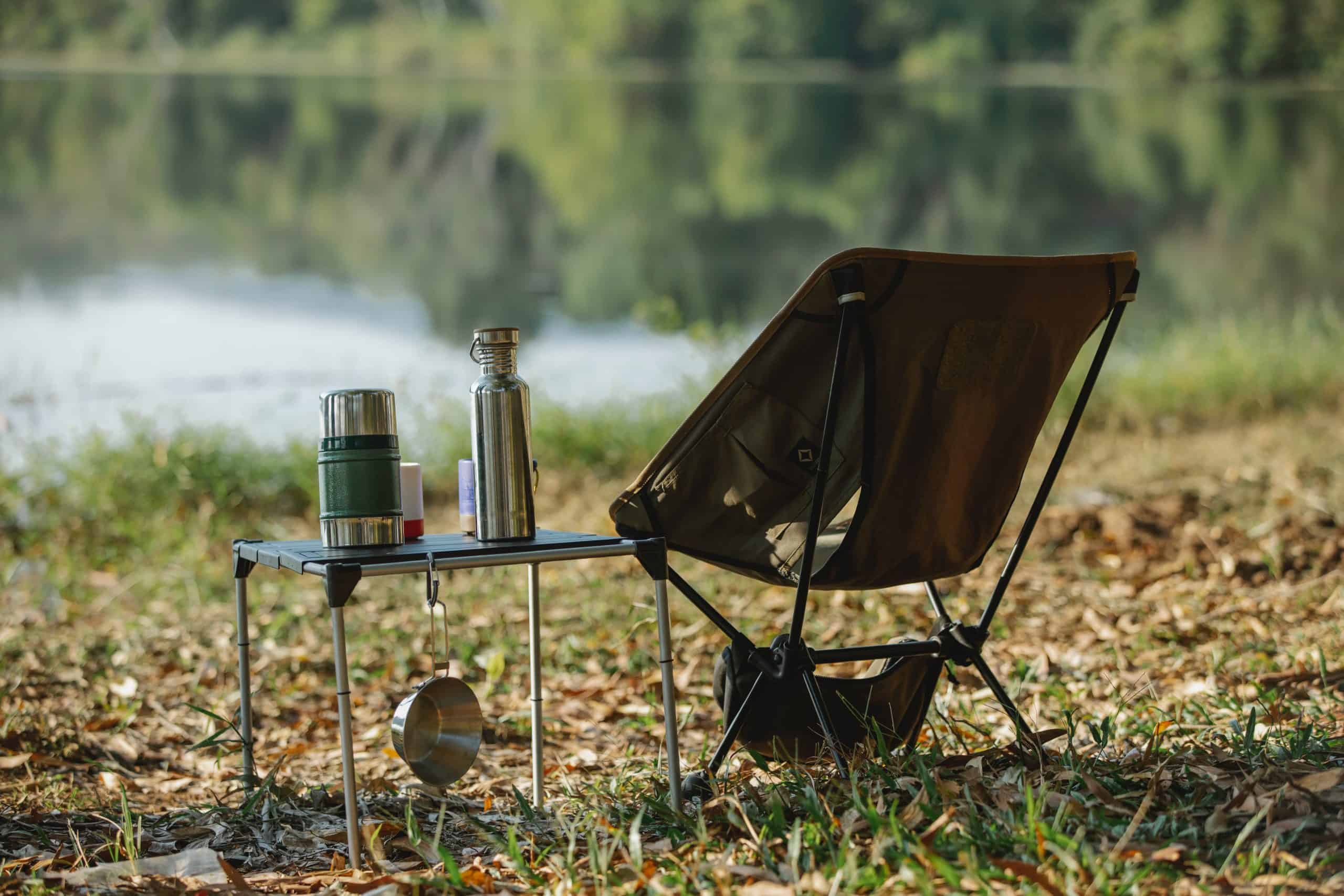 camping-table-beside-river