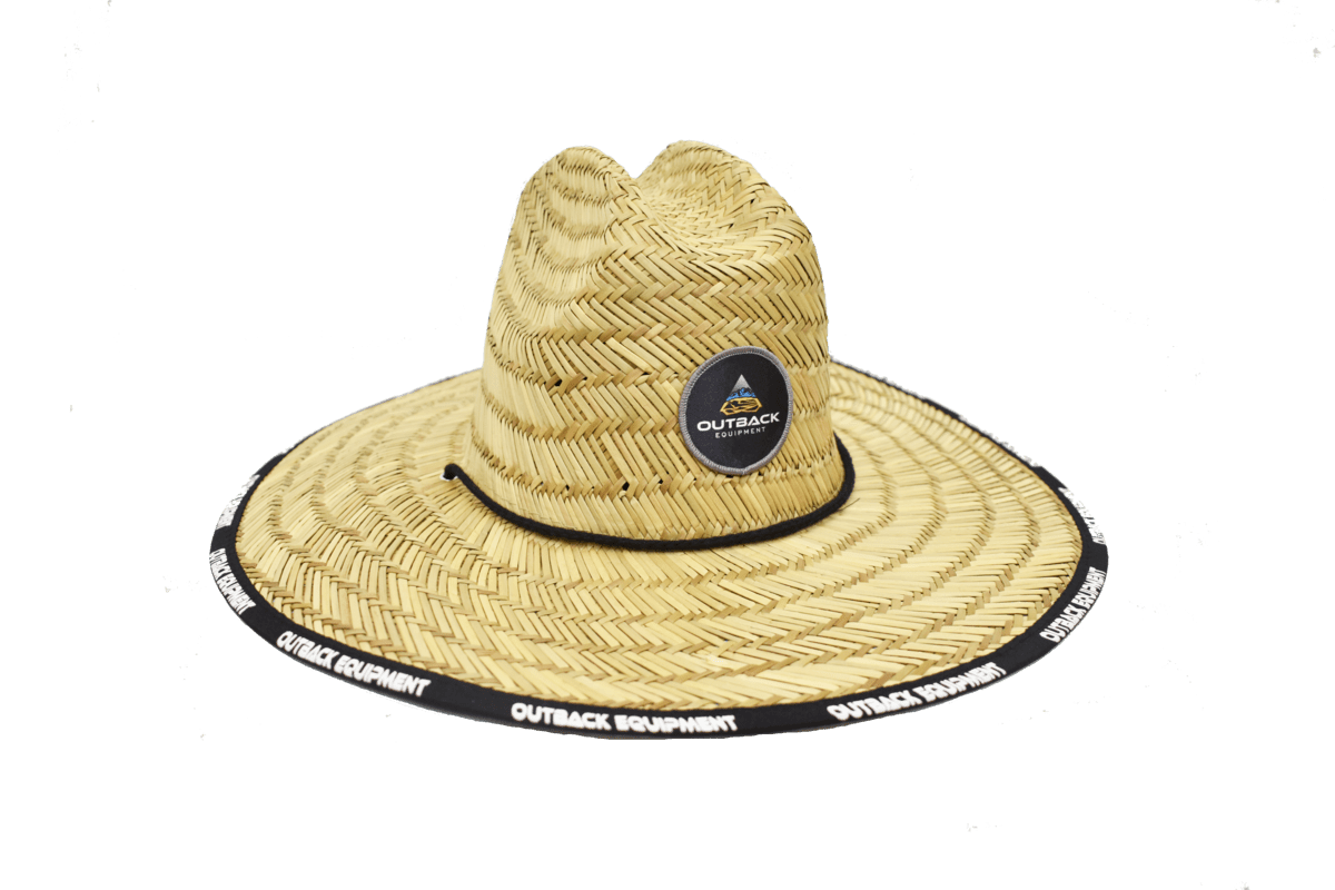 a straw hat on a green background.