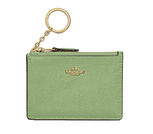 a small green purse with a key chain.
