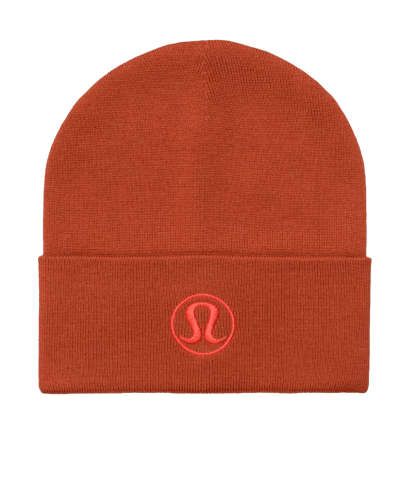 a red beanie with a red logo on it.