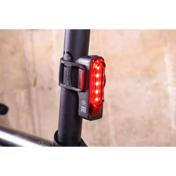 A bike light accessory featured on a bike in close-up view.